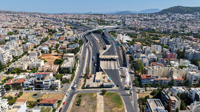 Aerial drone photo of popular multilevel highway junction overpass of Attiki Odos road, passing through Doukisis Plakentias Avenue with light traffic, Athens, Attica, Greece