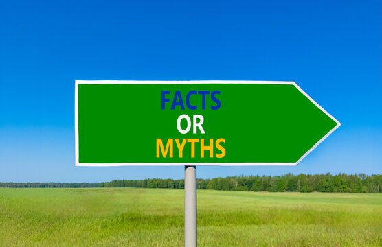 Facts or myths words symbol. Concept words Myths or Facts on beautiful green road sign. Beautiful blue sky green grass background. Business and facts or myths concept. Copy space.