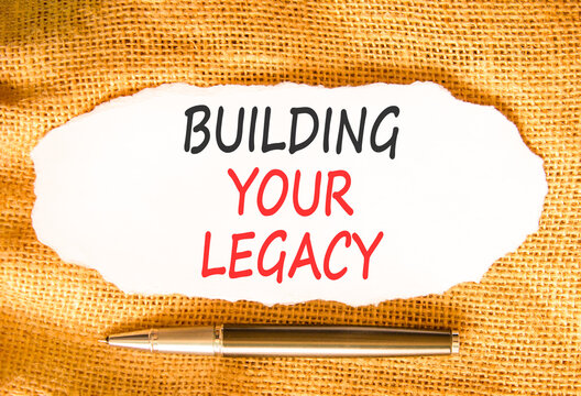 Building your legacy words symbol. Concept words Building your legacy on beautiful white paper. Beautiful canvas background. Black pen. Business building your legacy concept. Copy space.