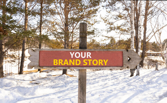 Branding and your brand story symbol. Concept words Your brand story on beautiful road sign. Beautiful winter forest background. Business branding your brand story concept. Copy space.