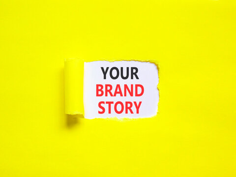 Branding and your brand story symbol. Concept words Your brand story on beautiful white paper. Beautiful yellow paper background. Business branding your brand story concept. Copy space.