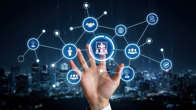 Human hand reaching towards a glowing digital network interface with representing business meetings, teamwork, and global connections at night