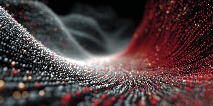 Abstract flowing landscape of red, black and silver particles forming dynamic waves with glowing details