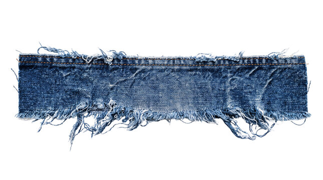 Frayed blue denim fabric strip, distressed jean material with ragged edges, textured cotton textile scrap on white background