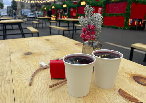 two cups of wine on a table