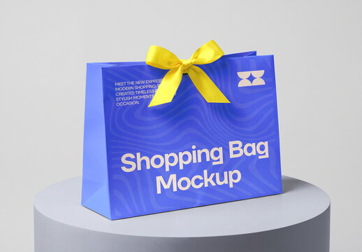 Shopping Bag Mockup with Yellow Ribbon Bow on Podium