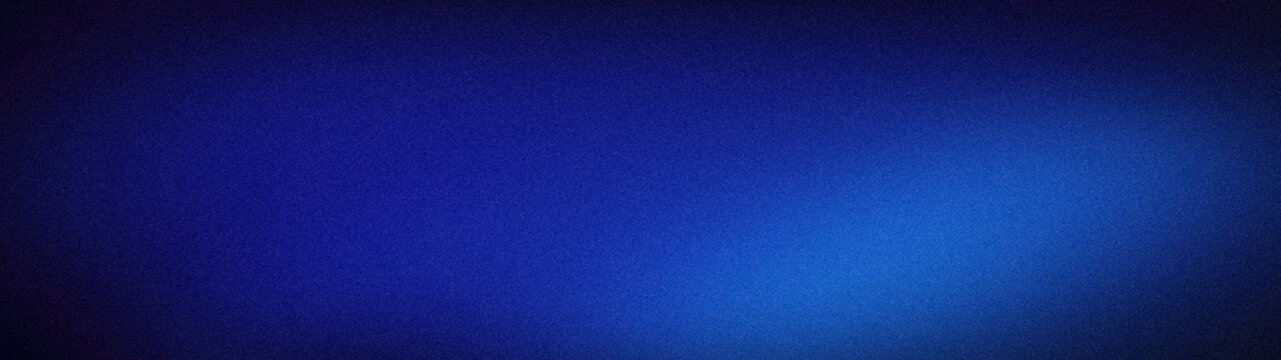Dark blue vibrant grainy gradient background wallpaper with deep navy and cobalt shades wide format backdrop