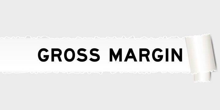 Ripped gray paper background that have word gross margin under torn part