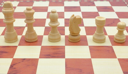 Wooden chess game. Concept pieces. Size order. King, queen, bishop, knight, rook and pawn. © Martin of Sweden