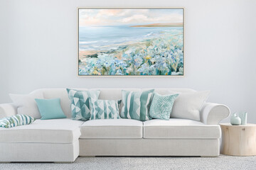 Fototapeta premium Coastal living room interior design featuring a comfortable sofa with decorative pillows and a large beach landscape painting