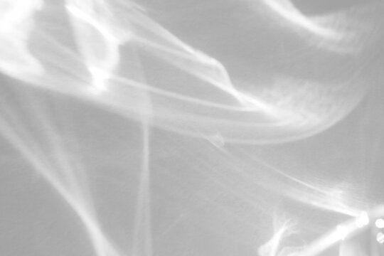 Real swirling water caustic shadow cut out on a transparent png background with soft diffused edges. Anchors an ethereal wellness overlay, mysterious and dreamlike design as a transparent png layer.