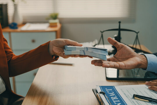 Person accepting money, representing bribery or corruption