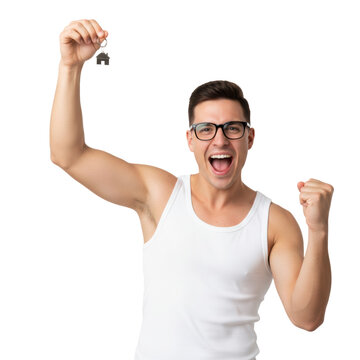 Shouting caucasian man in white tank top holding a house key and pumping fist in a bright minimalist studio concept of home ownership