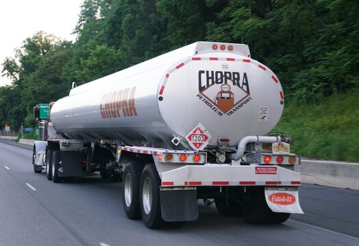 Pennsylvania, U.S.A - Jul 11, 2026 - Chopra fuel tanker truck carrying flammable gasoline on the highway.