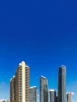 Gold Coast city skyline with modern skyscrapers against blue sky