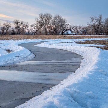 bike trail in winter scenery - Poudre River Trail in northern Colorado between WIndsor and Greeley