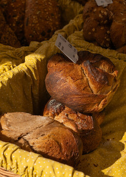 Various types of bread at a bakery market stall, Rapperswil, Switzerland, farmers market.
