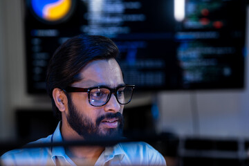 Senior AI architect analyzing neural network performance metrics on a high-resolution display,...