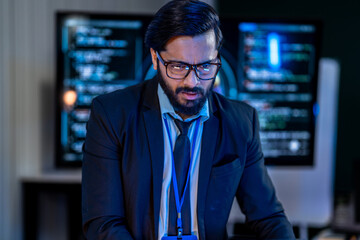 Fototapeta premium Engineering specialist evaluating AI model inference performance against real time code logs on a collaborative high resolution display.