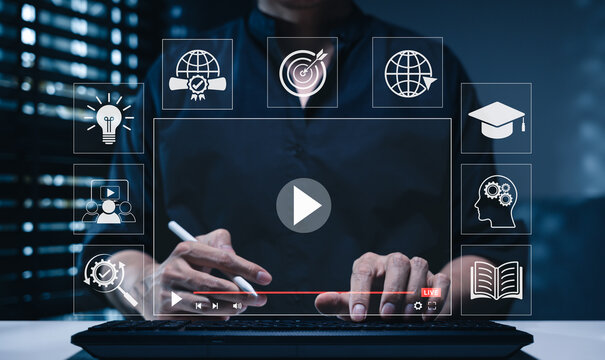 Online education and e-learning concept. Person using computer with icons representing online education, learning, knowledge sharing, educational tools, training, webinar on internet, digital courses