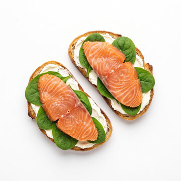 Appetizing salmon toast with cream cheese and fresh spinach