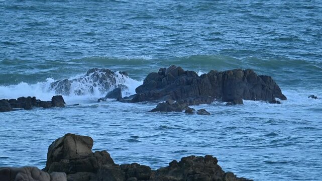 wave and rock at slow motion