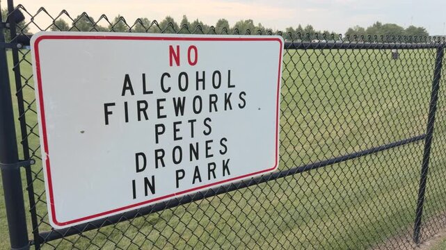 No alcohol fireworks pets drones in park sign 4k

