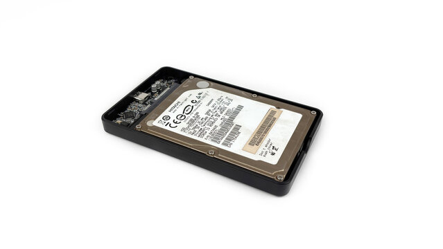 Kediri, East Java, Indonesia &ndash; August 21, 2026: Computer Hard Disk Drive with Metallic Cover and Label Displayed on White Background