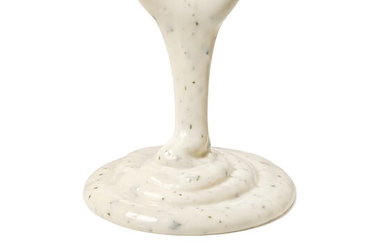 Thick Creamy Ranch Dressing Pour with Herb Specks