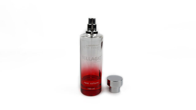 Kediri, East Java, Indonesia &ndash; August 21, 2026: Transparent Perfume Bottle with Metallic Cap and Red Liquid Displayed on White Background