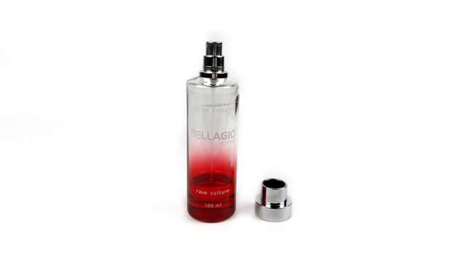 Kediri, East Java, Indonesia &ndash; August 21, 2026: Transparent Perfume Bottle with Metallic Cap and Red Liquid Displayed on White Background