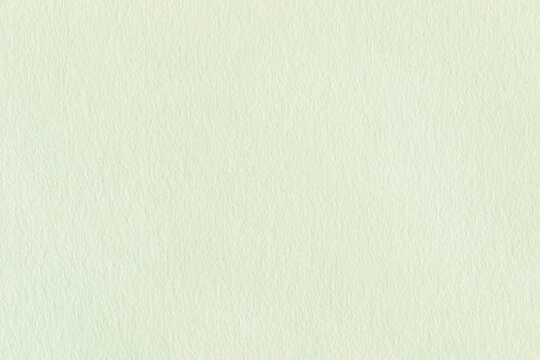 White ribbed paper texture background. Natural grainy surface texture for design.	