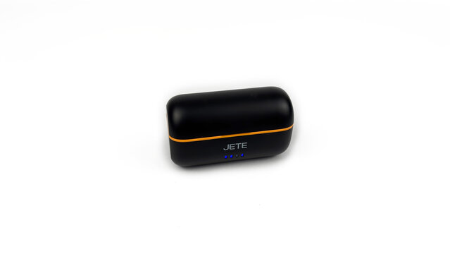 Kediri, East Java, Indonesia &ndash; August 21, 2026: Black and Orange Wireless Microphone Case with Components Displayed on White Background