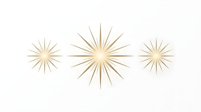 Set of three golden starburst light effects isolated on white background