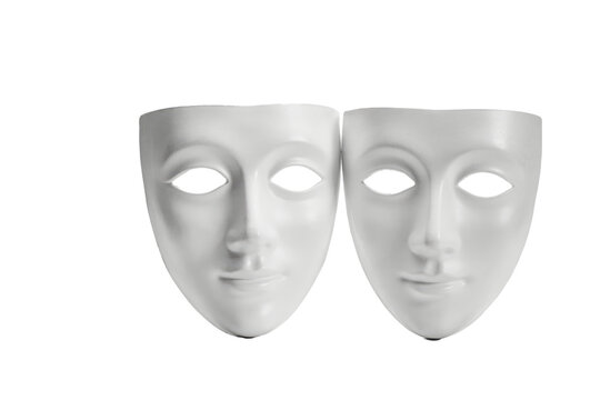 Two identical white plastic face masks placed side by side on a plain surface isolated on a transparent background