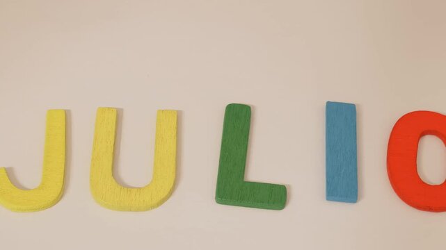 colorful wooden letters spelling out the word "Julio"