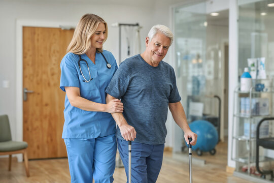 Nurse physical therapy assists elderly man with cane. He smiles warmly, showing confidence. They walk together in a bright, clean clinic. Supportive care is evident in their shared focus