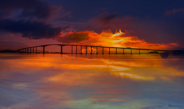 Arctic city of Tromso with Sandnessund bridge at sunset - Tromso, Norway