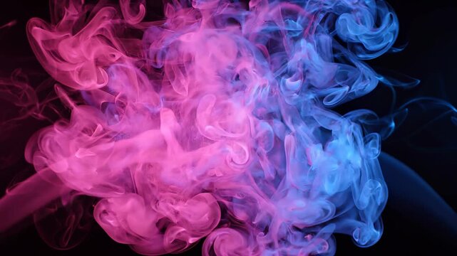 Vibrant pink and blue smoke streams collide and mix against a dark background, forming intricate abstract patterns.