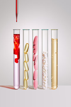 Different types of liquids and pills in test tubes