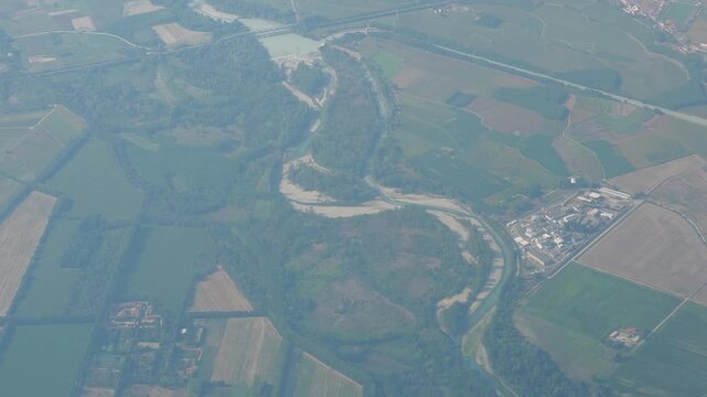 Aerial 4K video footage of drought-stricken Europe seen from above, showing major European rivers severely dried up by extreme drought, exposed riverbeds and the effects of climate change