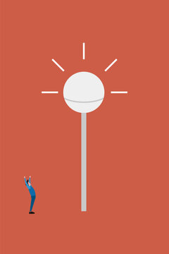 Happy businessman standing near a huge shining street light bulb celebrating a great business discovery and innovative concept