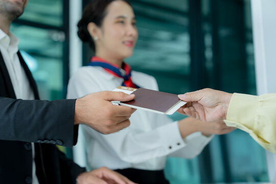 Professional staff assist an older customer with a document at a contemporary service counter representing efficient communication trust and customer satisfaction.