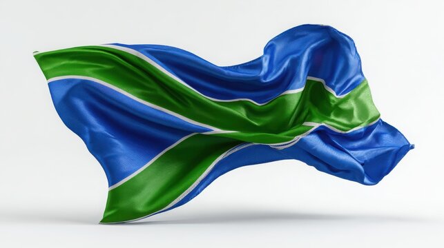 Waving Lesotho flag isolated on white background, national symbol of Lesotho fabric texture.