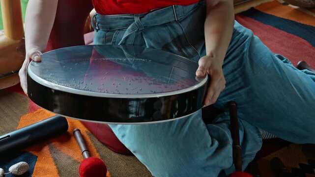 Wonan's Hands playing on ocean drum in the gazebo. Healing medicine and meditation