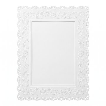 An ornate white picture frame with intricate floral detailing and a lace-like border stands empty, ready to showcase a cherished memory.