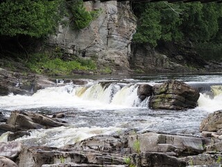 Rocky river rapids and small natural cascades © Oleksandr