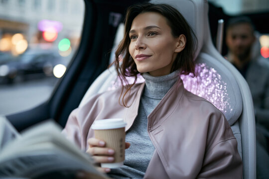 Elegant Businesswoman Commuting in Modern Luxury Car