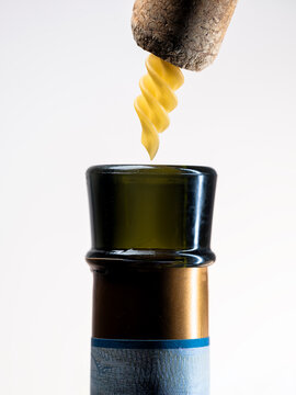 Close-up of a conceptual corkscrew opening a bottle of wine