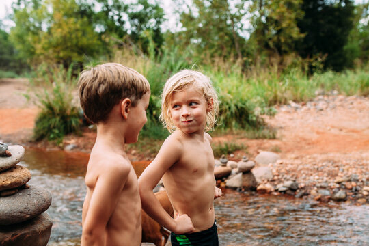 Little boys Playing in River